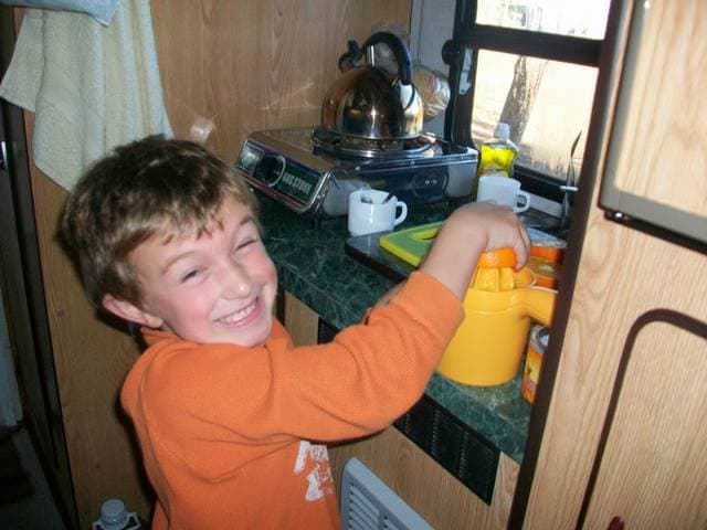 Henry making morning juice for everyone