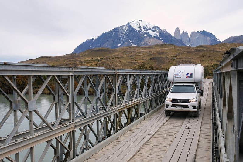 View of mountains and glaciers from a camper road trip through Patagonia